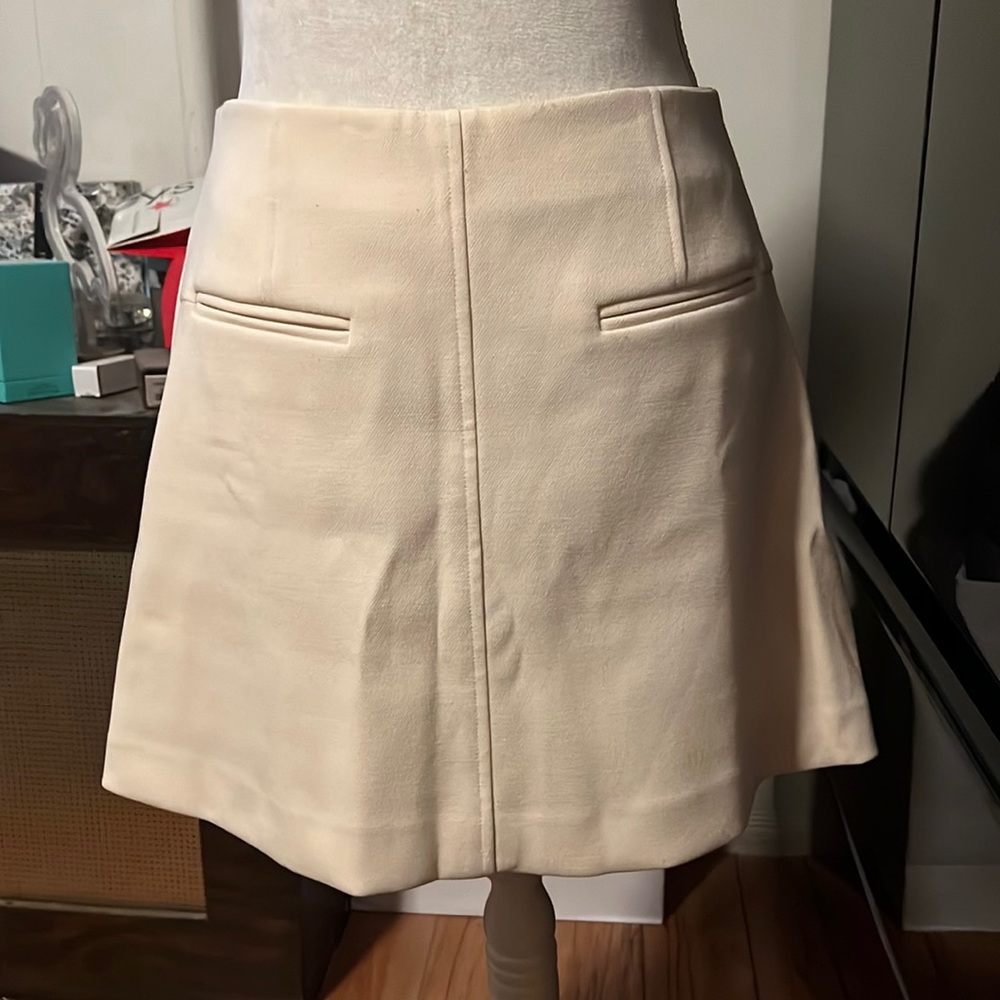 Chelsea 28 medium cream skirt with mock pockets and lining underneath